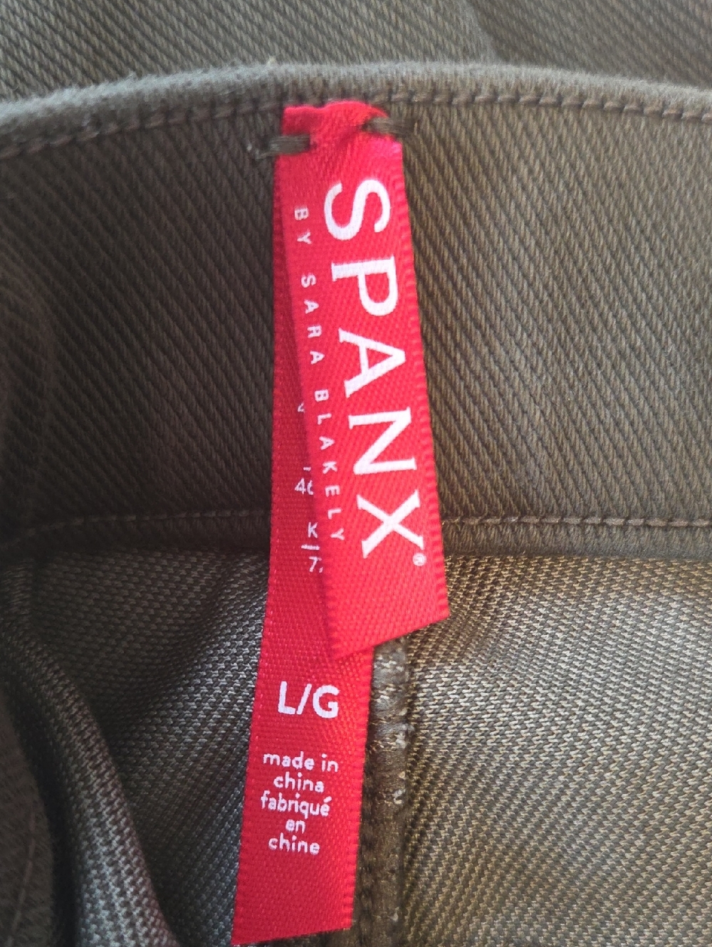 SPANX Black High-Waist Sculpting Leggings with Red Brand Tag